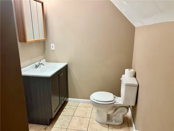 a bathroom with a sink and a toilet