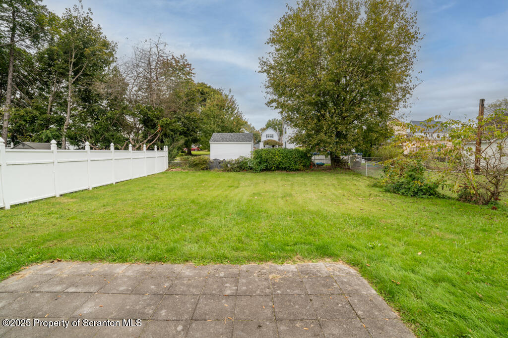 717 Beech Street Old Forge, PA 18518 - Photo 4 of 27 a view of a trees with a yard