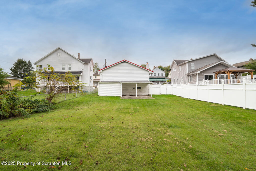 717 Beech Street Old Forge, PA 18518 - Photo 5 of 27 a view of a big house with a big yard and large trees