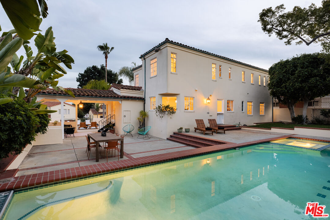 3681 Fairland Boulevard View Park, CA 90043 - Photo 1 of 54 a view of a house with swimming pool and sitting area