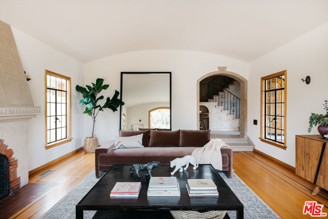 3681 Fairland Boulevard View Park, CA 90043 - Photo 12 of 54 a living room with furniture and a window