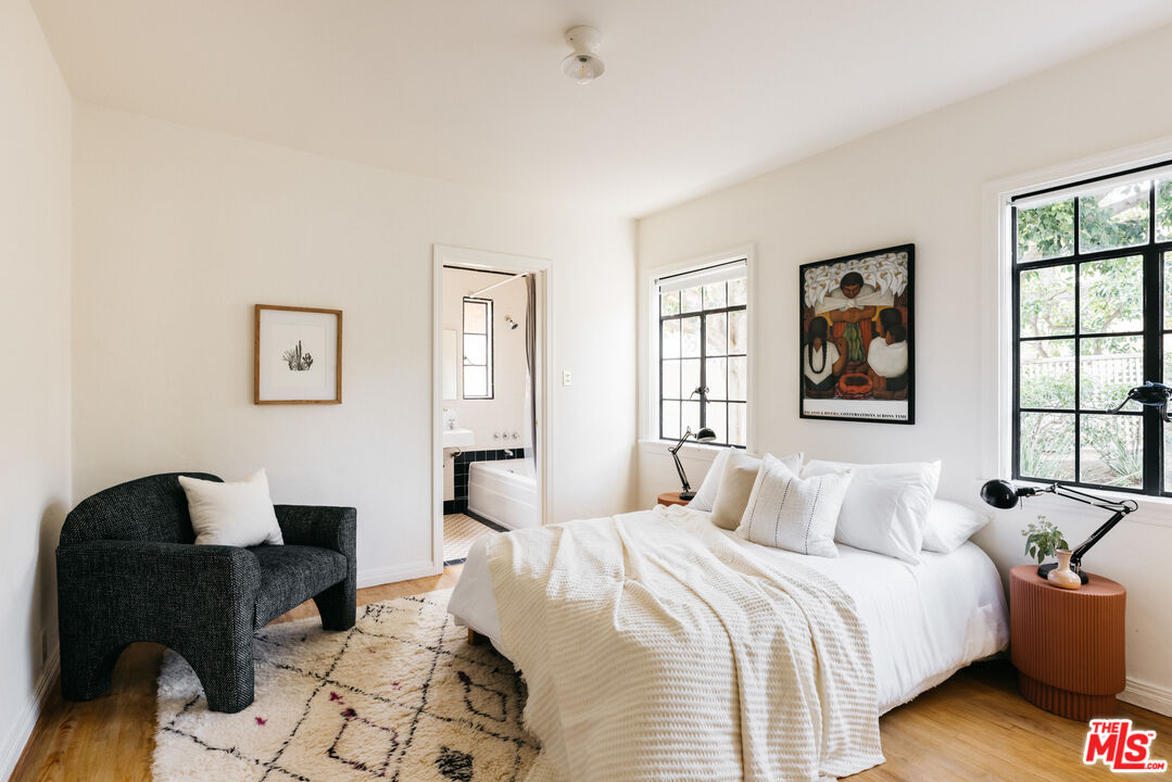 3681 Fairland Boulevard View Park, CA 90043 - Photo 29 of 54 a bedroom with bed and window