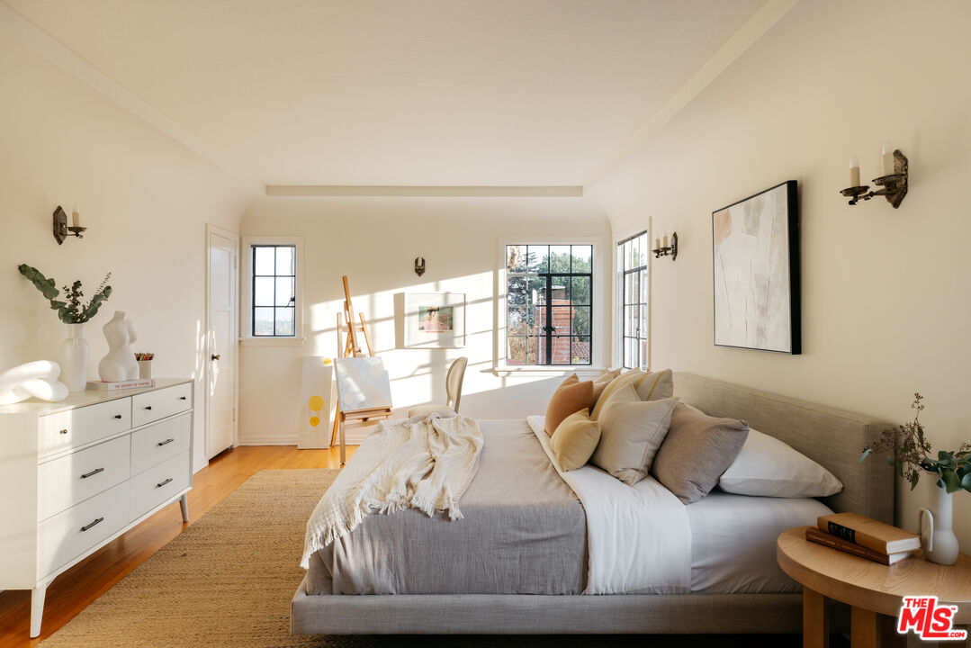 3681 Fairland Boulevard View Park, CA 90043 - Photo 43 of 54 a bedroom with a bed and window