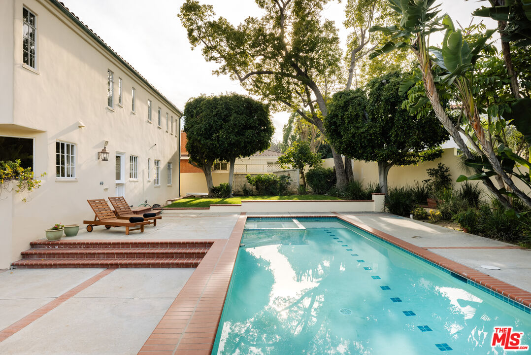 3681 Fairland Boulevard View Park, CA 90043 - Photo 48 of 54 a view of swimming pool with chairs