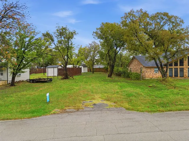 a view of a house with a big yard
