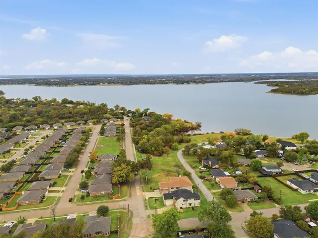 a view of a city with an ocean view
