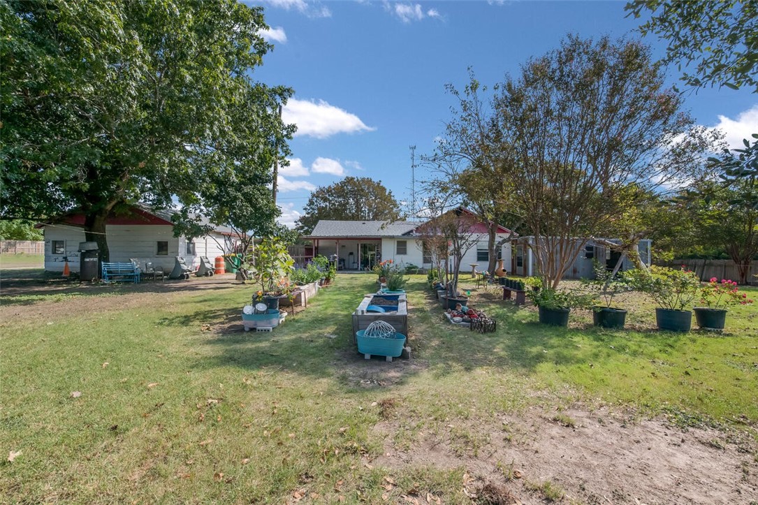 901 South Old Robinson Road Robinson, TX 76706 - Photo 25 of 55 a view of a house with backyard and sitting area