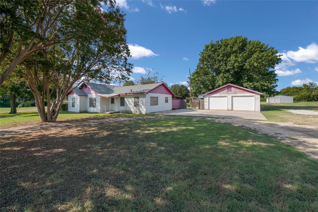 901 South Old Robinson Road Robinson, TX 76706 - Photo 3 of 55 a house view with garden space and trees