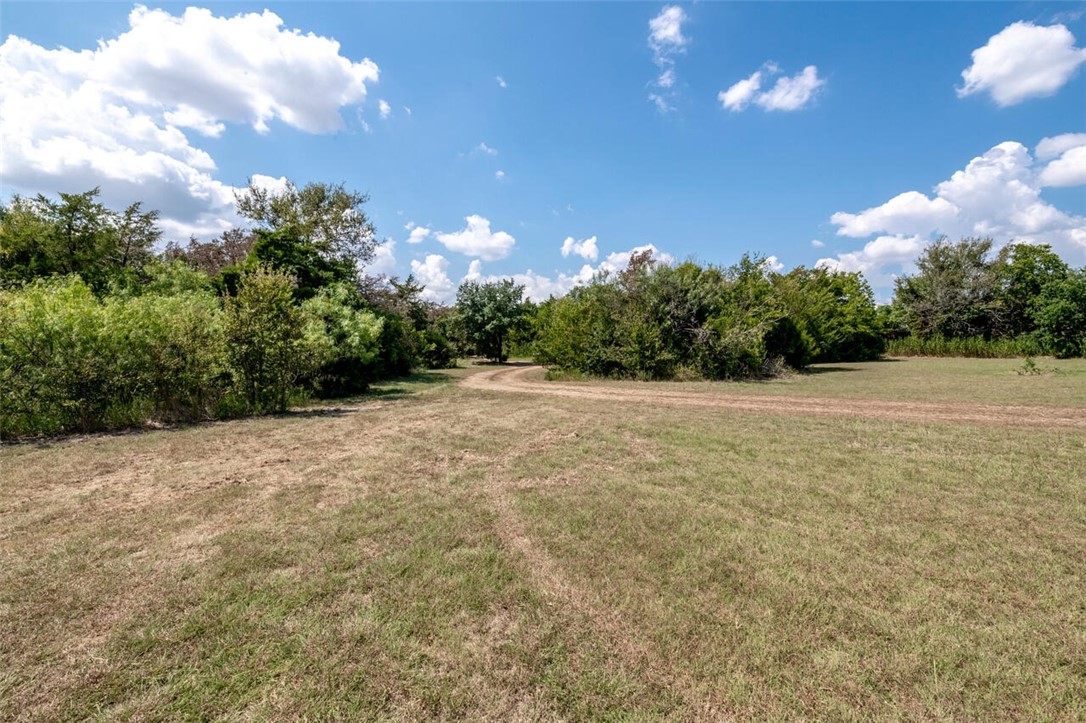 901 South Old Robinson Road Robinson, TX 76706 - Photo 47 of 55 a view of a yard with a tree
