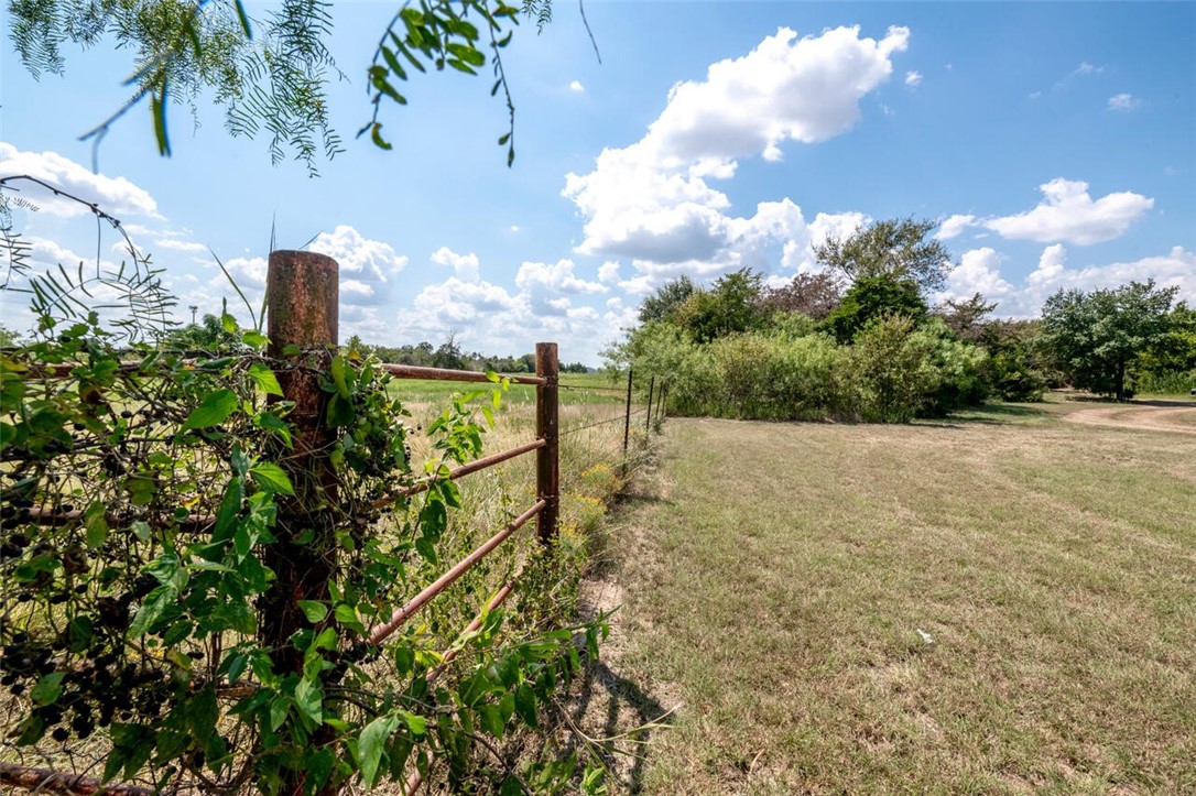 901 South Old Robinson Road Robinson, TX 76706 - Photo 48 of 55 a view of a yard with plants and wooden fence