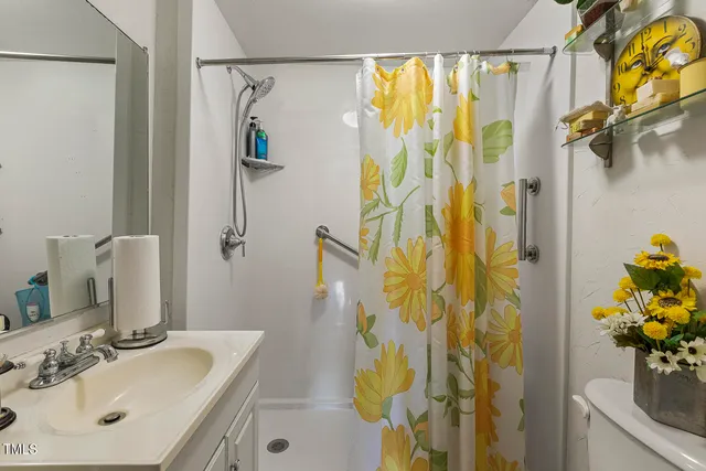 a bed room with furniture and a window