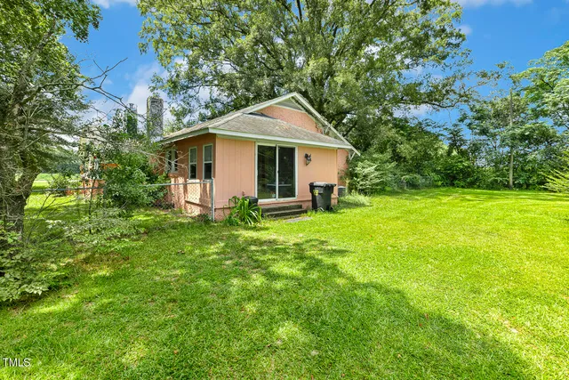 a view of a golf course with green space