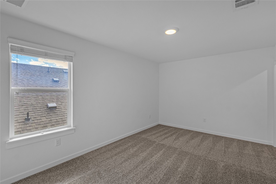 1925 Ruger Pass Leander, TX 78641 - Photo 18 of 26 an empty room with a window