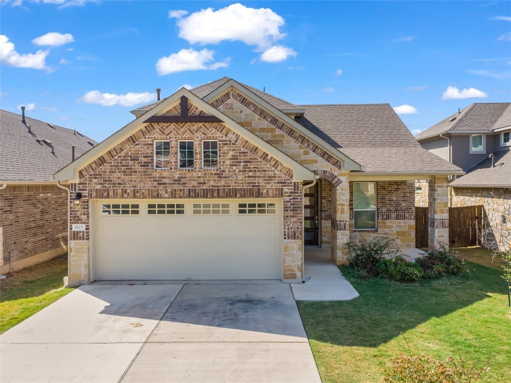 1925 Ruger Pass Leander, TX 78641 - Photo 2 of 26 a view of a house with a yard