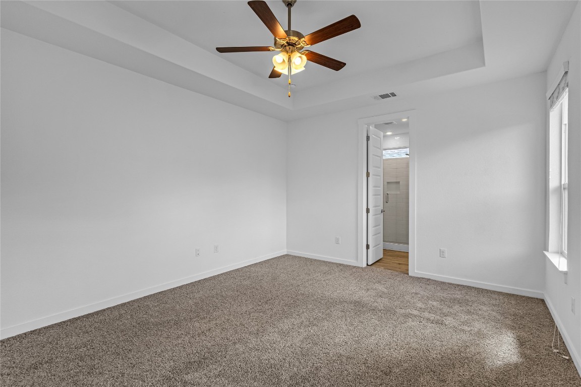 1925 Ruger Pass Leander, TX 78641 - Photo 10 of 26 an empty room with closet and fan