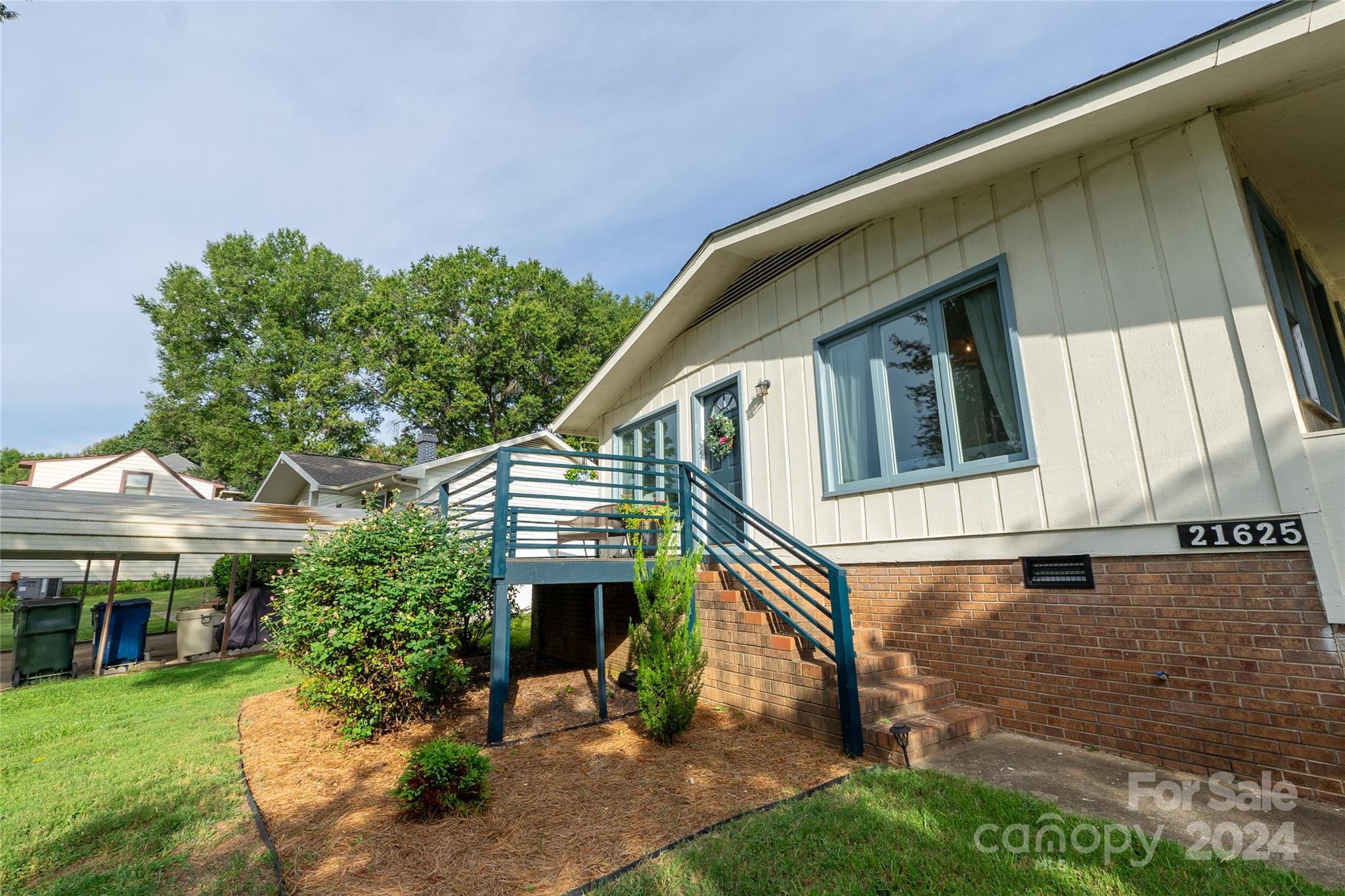 21625 Rio Oro Drive Cornelius, NC 28031 - Photo 23 of 31 a view of a house with a yard
