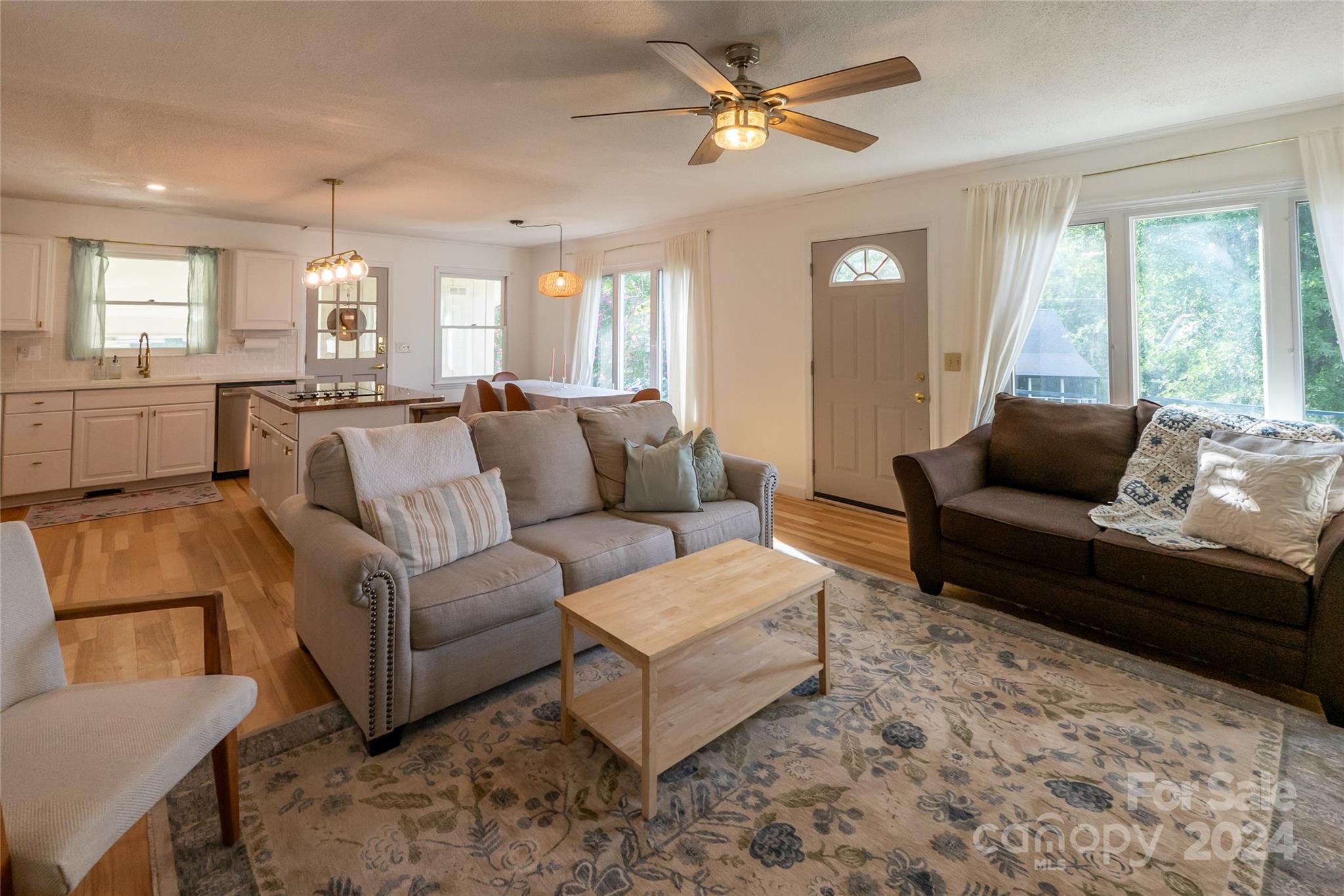 21625 Rio Oro Drive Cornelius, NC 28031 - Photo 10 of 31 a living room with furniture and a large window
