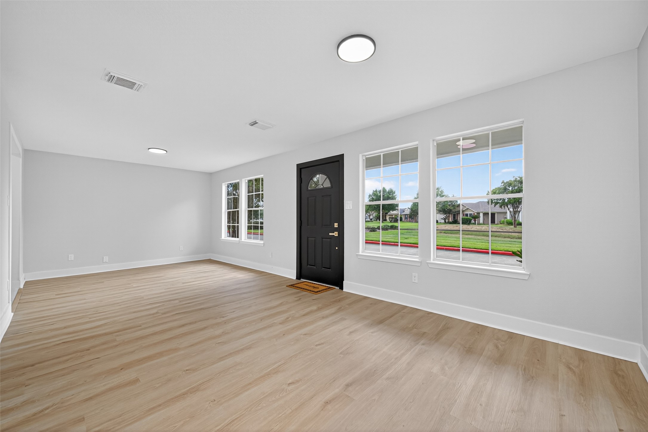 19515 Fletcher Way Drive Houston, TX 77073 - Photo 3 of 27 Greeted by a wide dining/living combo.