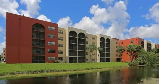 a front view of a building with lake view
