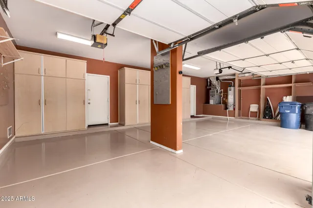 a view of a house with swimming pool and sitting area