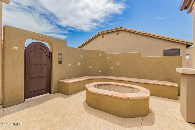 a view of a swimming pool with a patio
