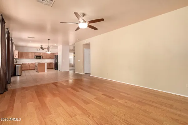 a view of a kitchen with a sink and a cabinet