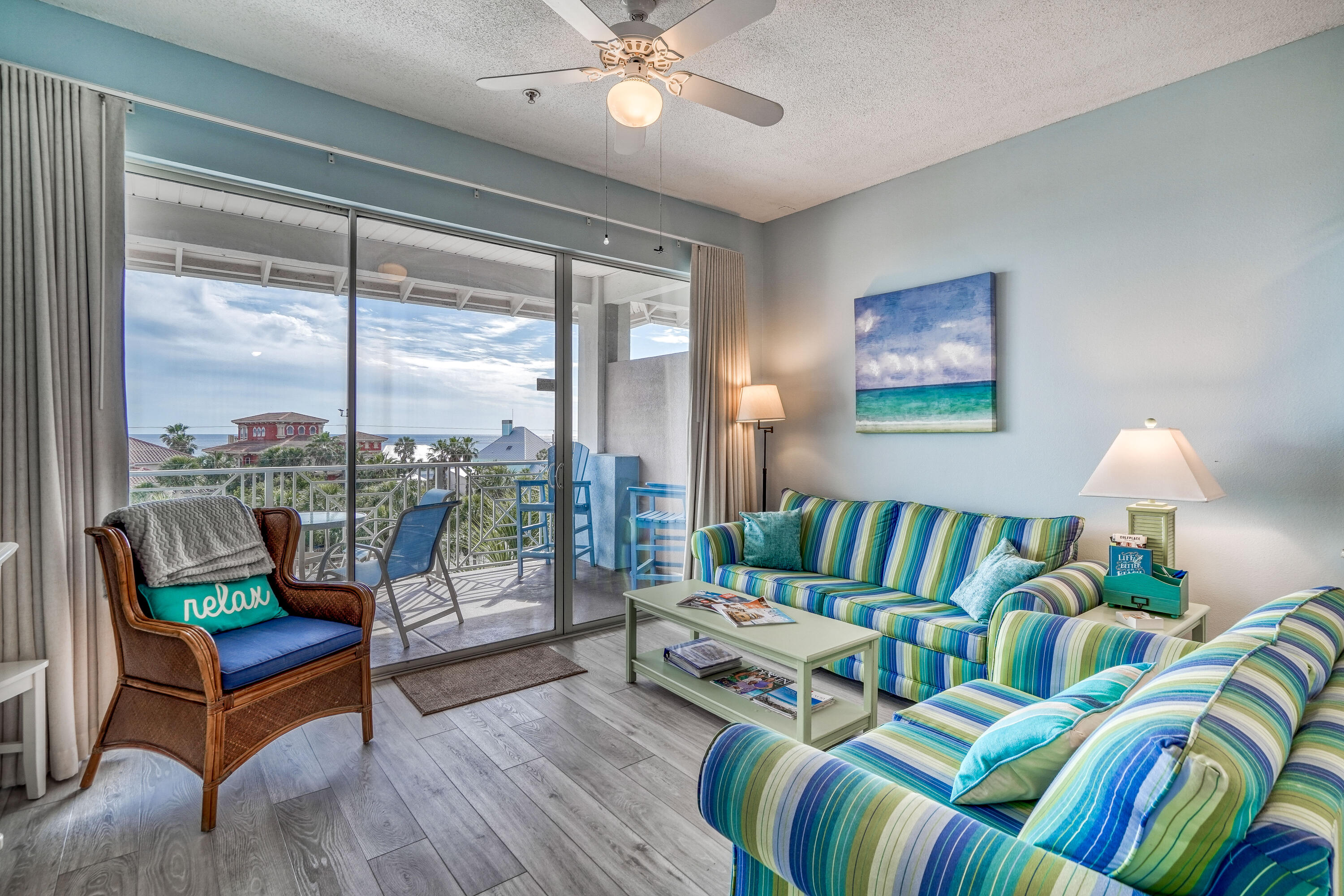 145 Spires Lane, Unit 406 Santa Rosa Beach, FL 32459 - Photo 2 of 38 a living room with furniture and a large window