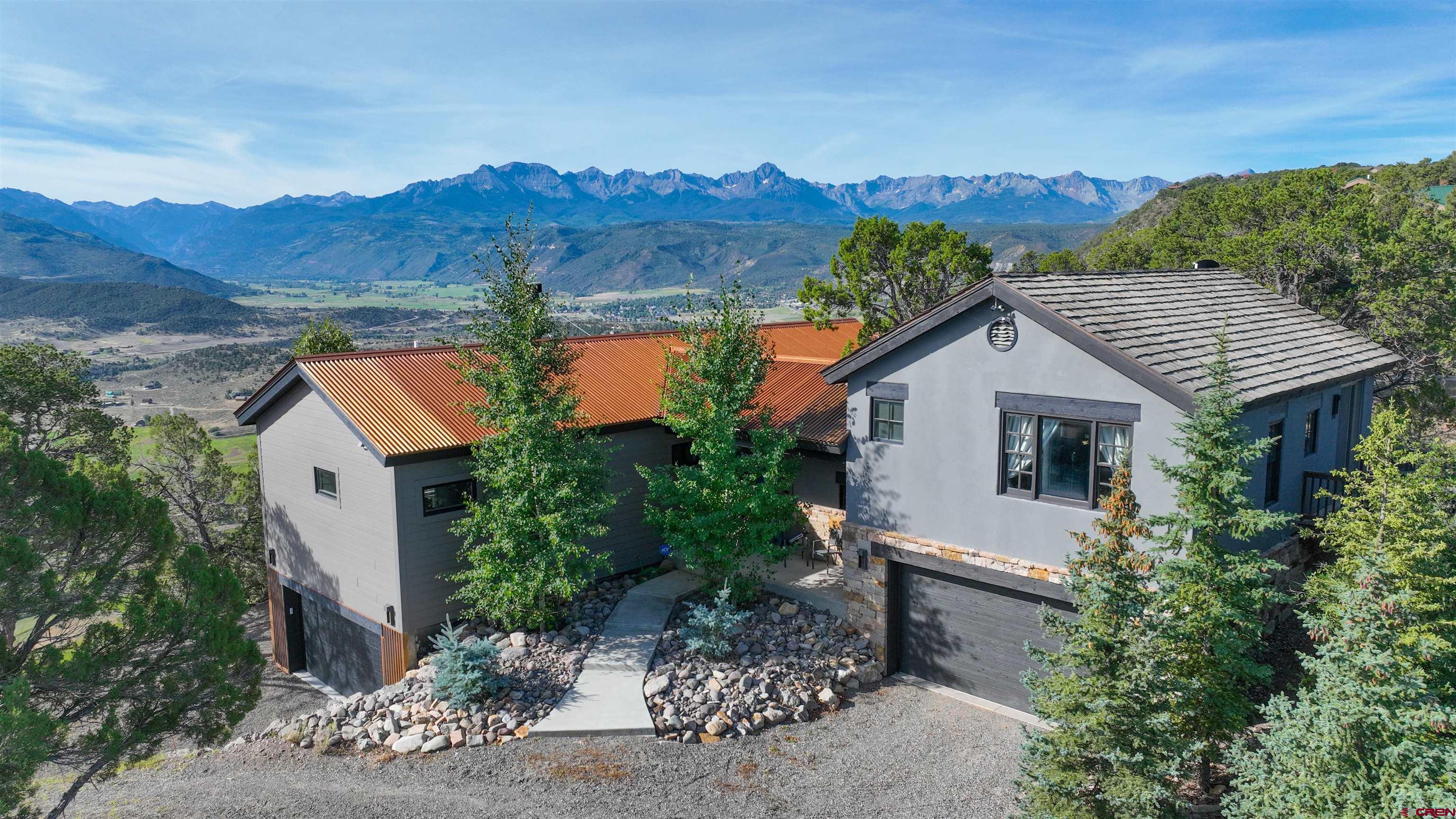 150 Enclave Road Ridgway, CO 81432 - Photo 1 of 45 an aerial view of house that has garden