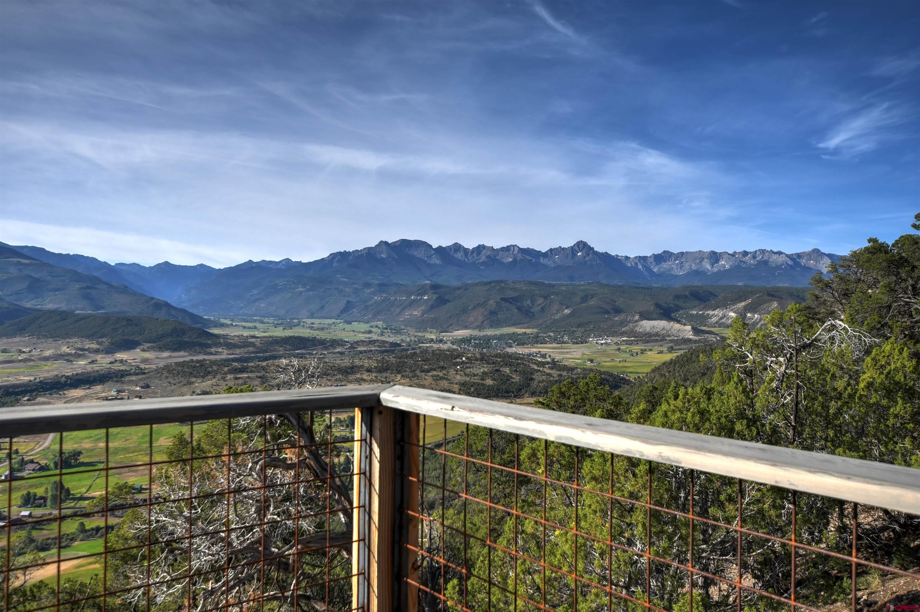 150 Enclave Road Ridgway, CO 81432 - Photo 21 of 45 a view of balcony with a yard and mountain view