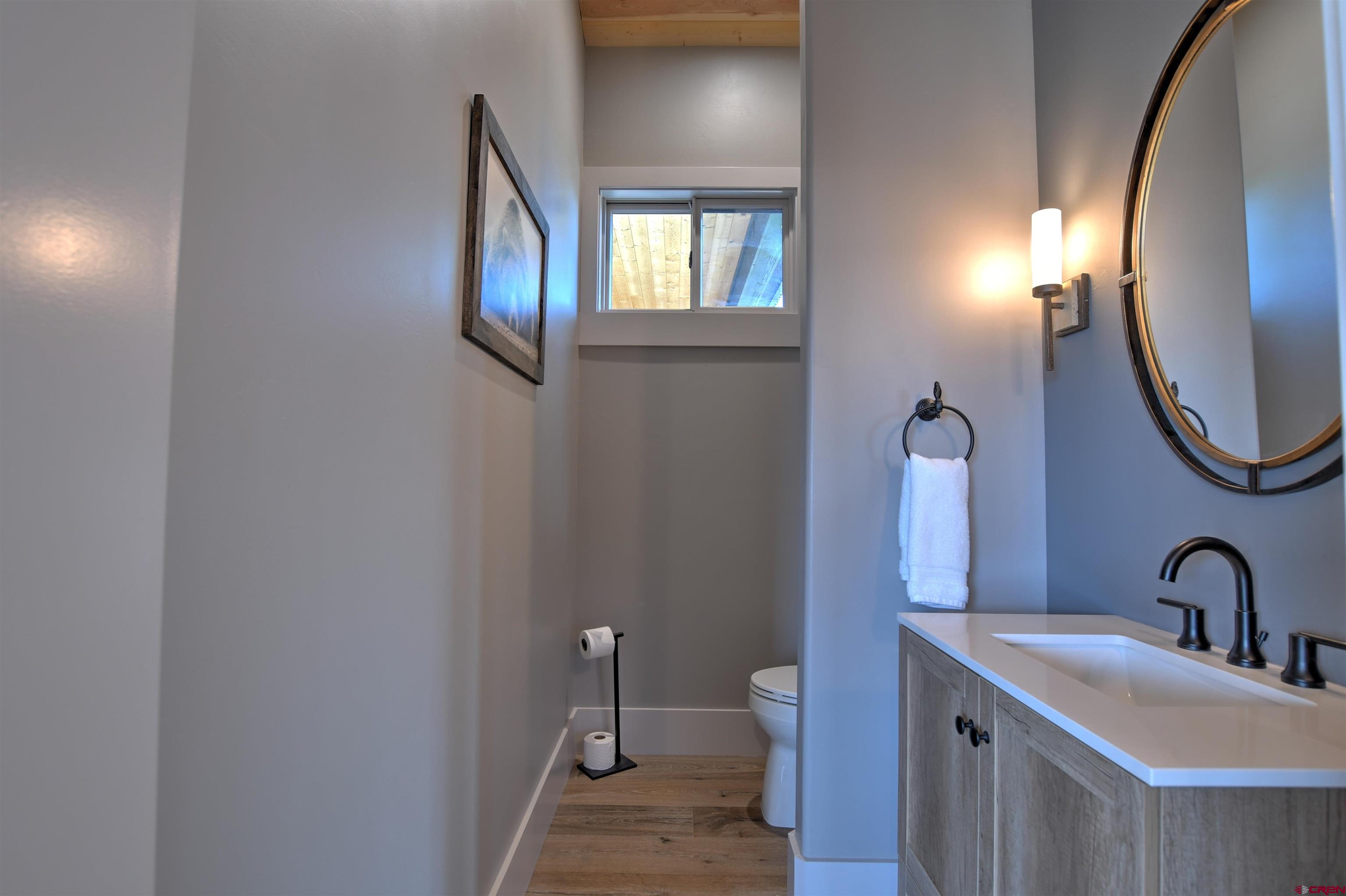 150 Enclave Road Ridgway, CO 81432 - Photo 41 of 45 a bathroom with a sink and a mirror