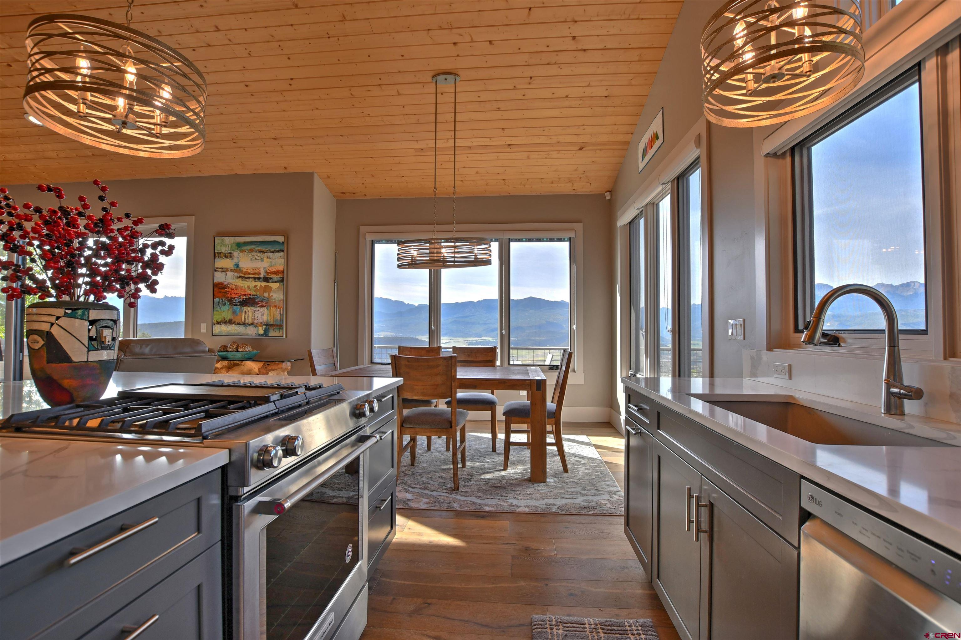 150 Enclave Road Ridgway, CO 81432 - Photo 5 of 45 a kitchen with lots of counter top space