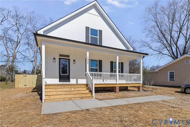 a front view of a house with porch