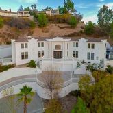 a view of a house with a garden