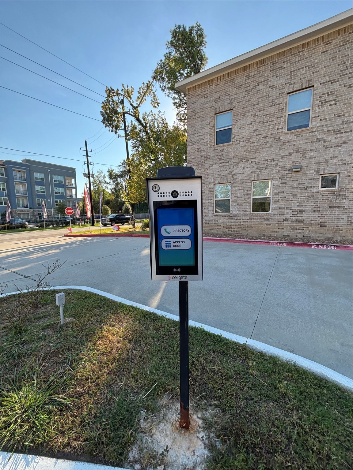 504 Nursery Road, Unit 1107 The Woodlands, TX 77380 - Photo 2 of 31 a sign board with brick walls