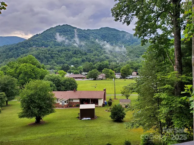 a view of an outdoor space yard lake and mountain view