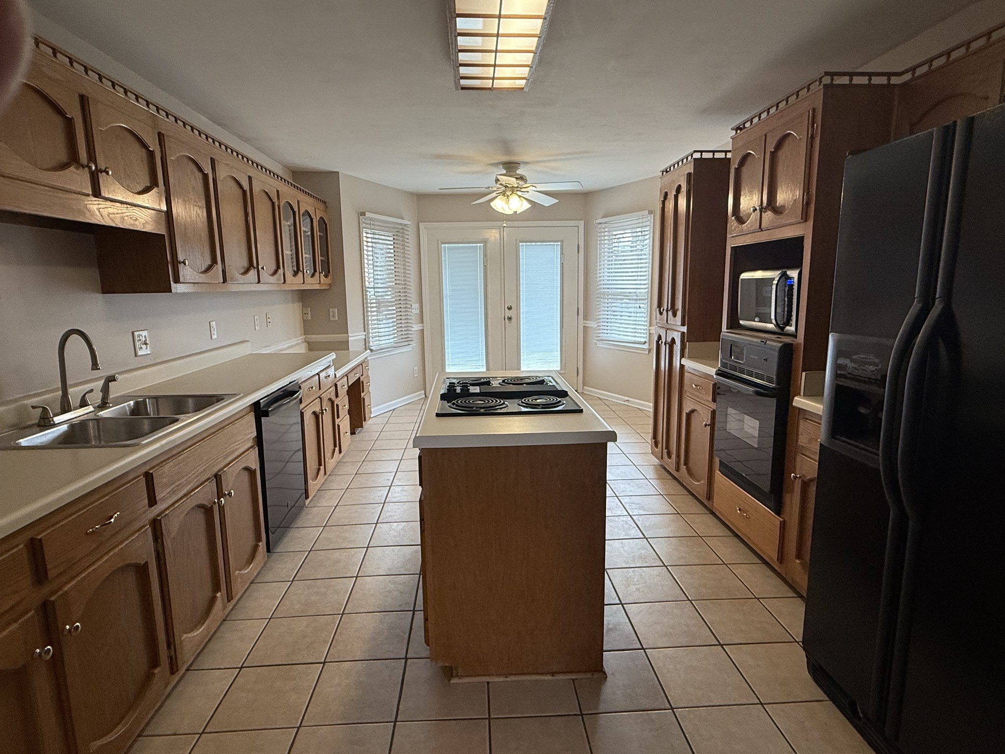 135 Lake Pointe Road La Vergne, TN 37086 - Photo 5 of 14 a kitchen with stainless steel appliances granite countertop a refrigerator a sink a stove and dishwasher
