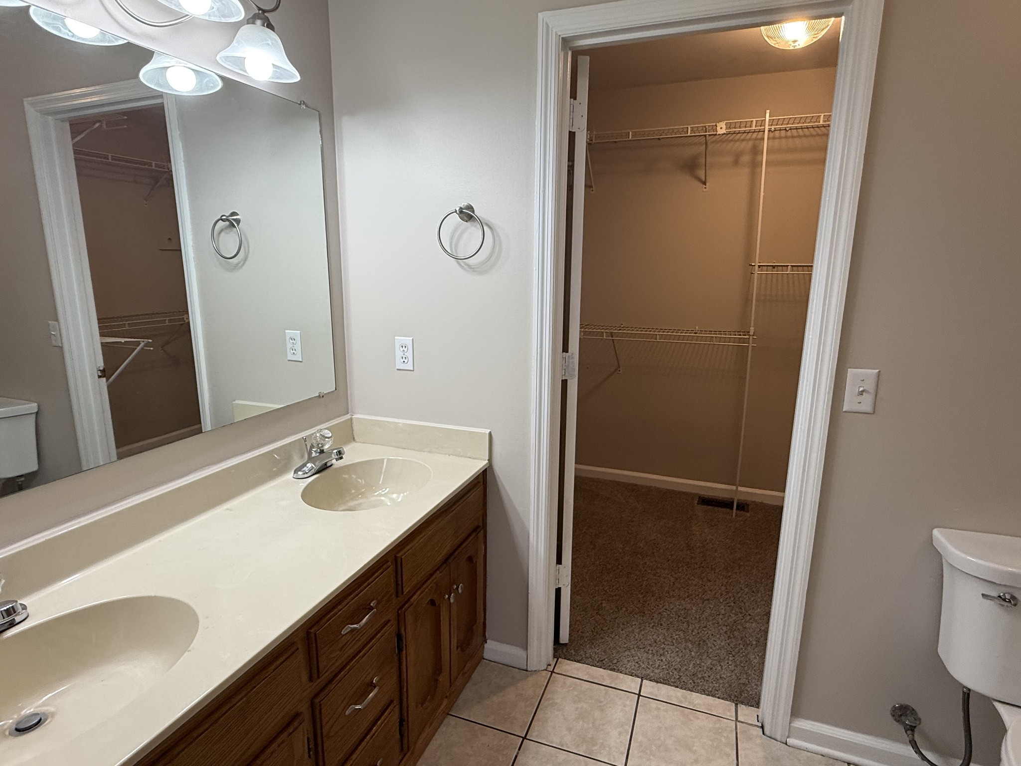 135 Lake Pointe Road La Vergne, TN 37086 - Photo 8 of 14 a bathroom with a sink vanity granite and toilet