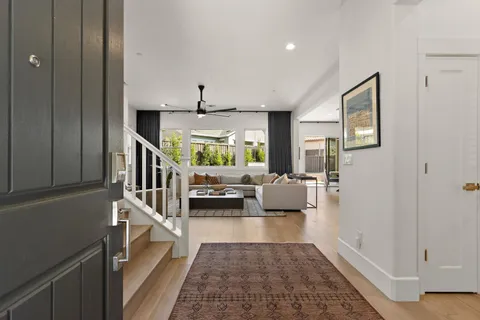 a living room with furniture and a table