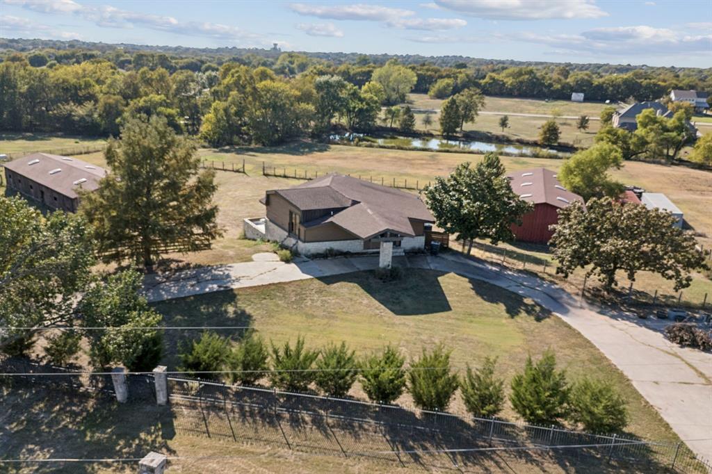 600 Long Road Lucas, TX 75002 - Photo 6 of 16 an aerial view of a house with a lake view