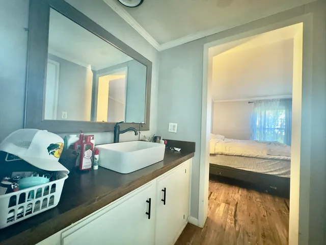 a bathroom with a bathtub and a sink