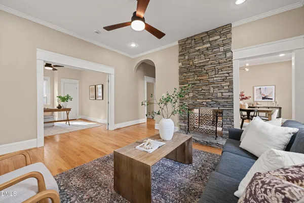 a living room with furniture and a rug
