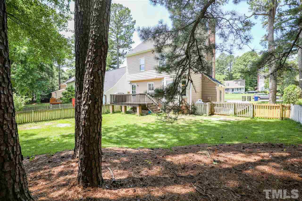 4841 Draper Road Raleigh, NC 27616 - Photo 27 of 30 a view of a yard with plants and trees