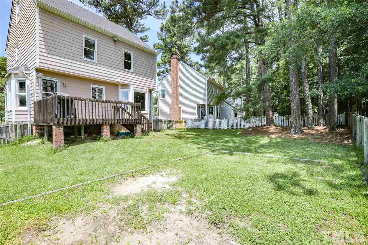 4841 Draper Road Raleigh, NC 27616 - Photo 28 of 30 a view of a house with a yard and sitting area