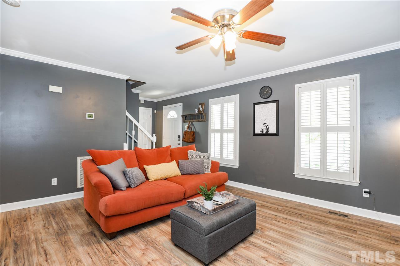 4841 Draper Road Raleigh, NC 27616 - Photo 8 of 30 a living room with furniture and a window