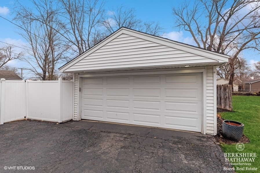 2408 George Street Rolling Meadows, IL 60008 - Photo 20 of 24 a view of house with a yard and garage