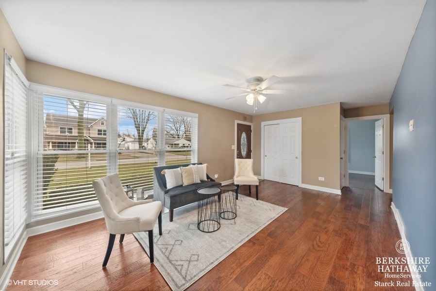 2408 George Street Rolling Meadows, IL 60008 - Photo 2 of 24 a view of a dining room with furniture and wooden floor