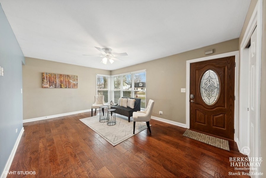 2408 George Street Rolling Meadows, IL 60008 - Photo 3 of 24 a living room with furniture and a window