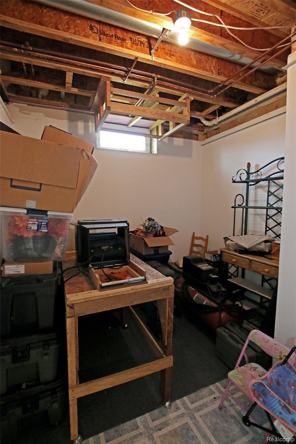 9026 Washburn Road Goodrich, MI 48438 - Photo 45 of 74 45) Lower Level Storage.jpg