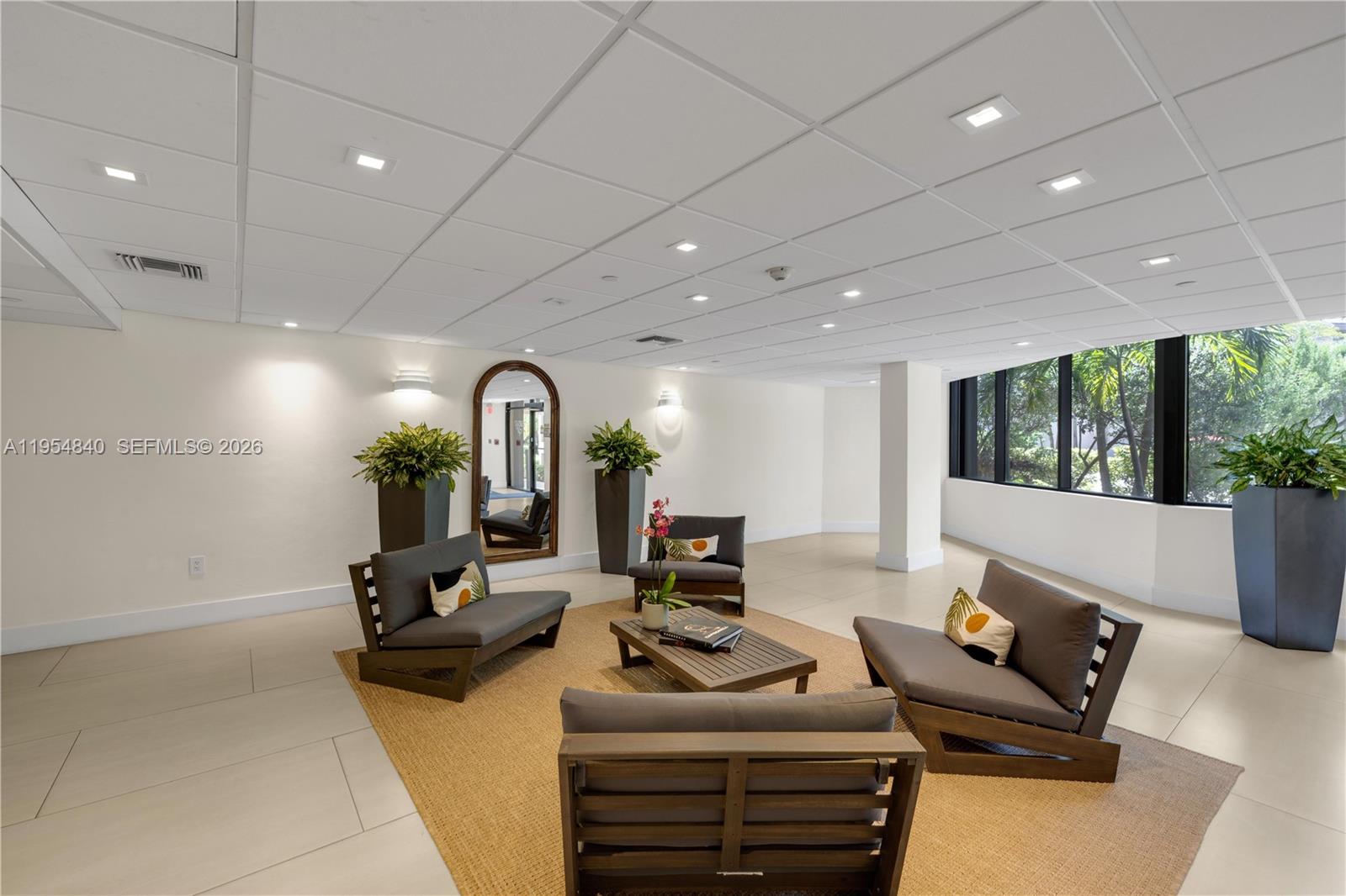 540 Brickell Key Drive, Unit 1514 Miami, FL 33131 - Photo 20 of 22 a living room with furniture