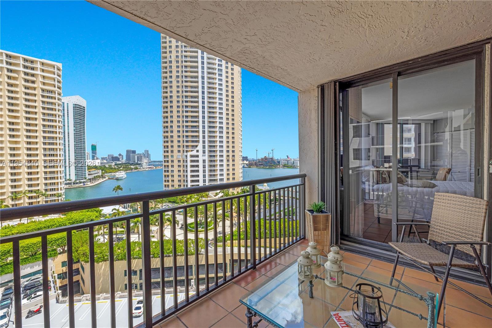 540 Brickell Key Drive, Unit 1514 Miami, FL 33131 - Photo 2 of 22 a view of a balcony with furniture